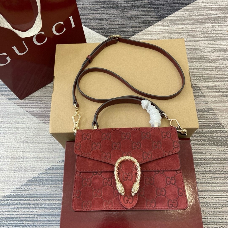 G*u*i top handle bags